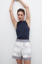 L158GTS2 MUSCULOSA CON BOTONES EN HOMBROS